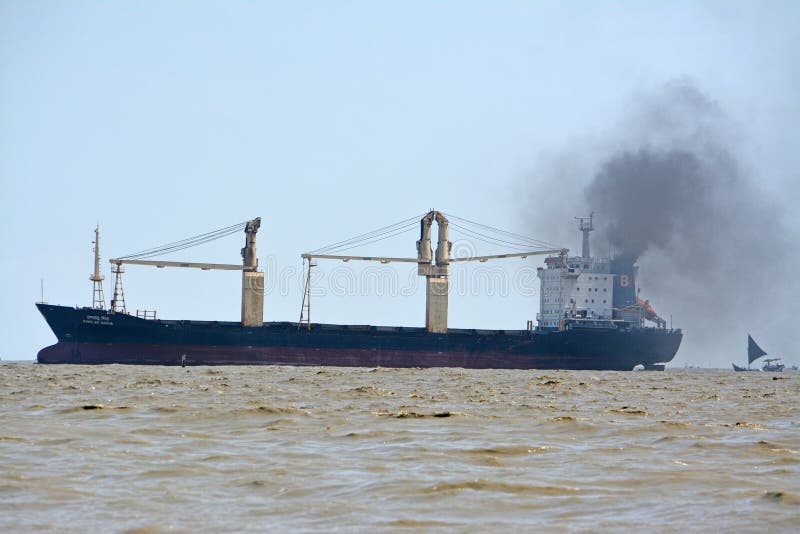 Inside of chittagong port yard and container handling from ship. loading unloading photographs. royalty free stock photography