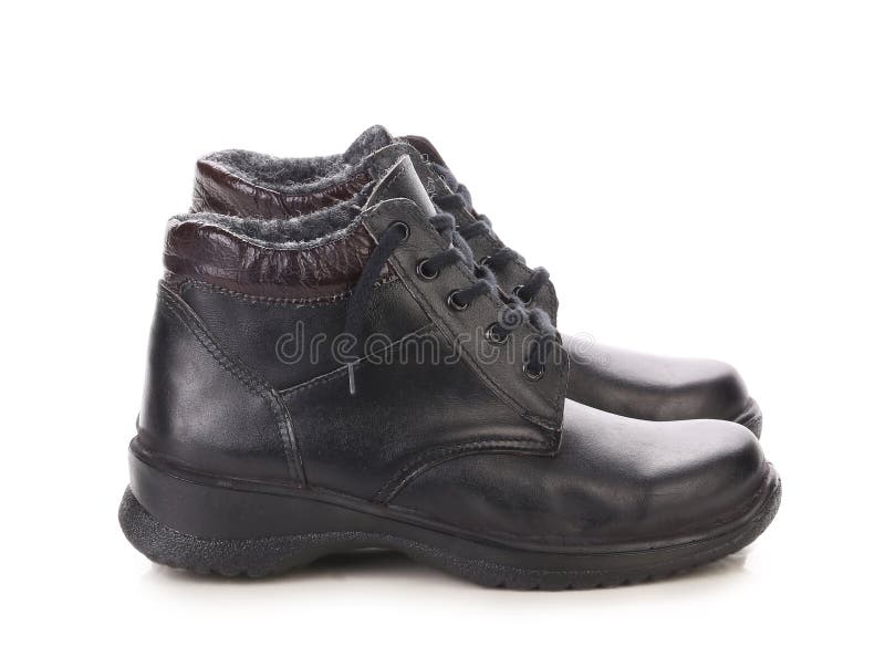 Chiuda su degli stivali dell'uomo dell'inverno. immagine stock libera da diritti Chiuda su degli stivali dell'uomo dell'inverno. immagine stock libera da diritti