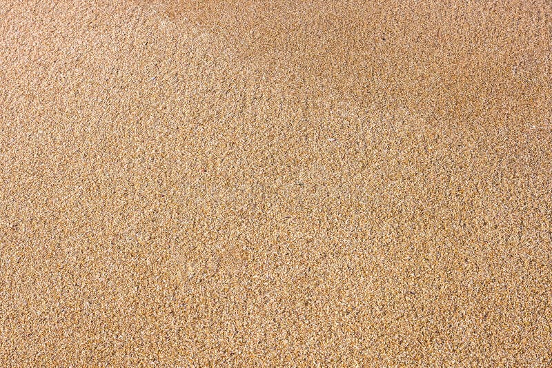 Chiuda su della sabbia della spiaggia del mare o della sabbia del deserto immagini stock Chiuda su della sabbia della spiaggia del mare o della sabbia del deserto immagini stock