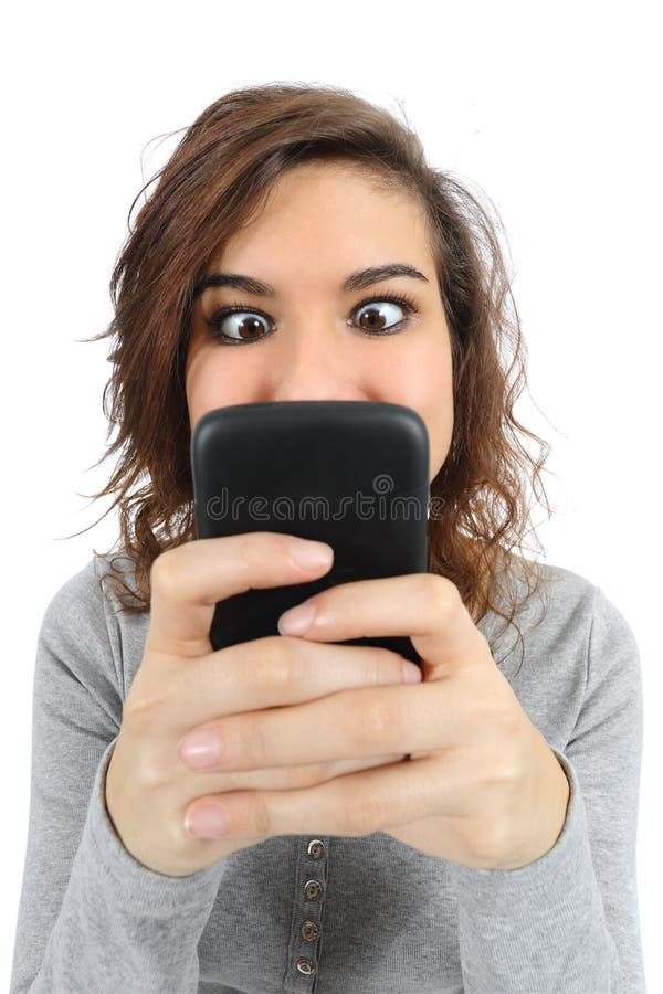 Close up of a teenager addicted to the smart phone isolated on a white background. Close up of a teenager addicted to the smart phone isolated on a white background