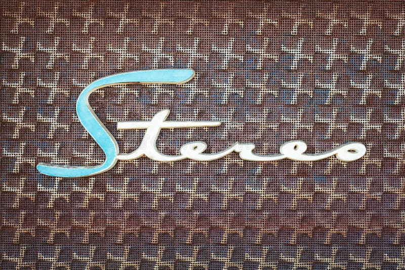 Close up of a vintage jukebox with the text stereo in blue with white. Close up of a vintage jukebox with the text stereo in blue with white