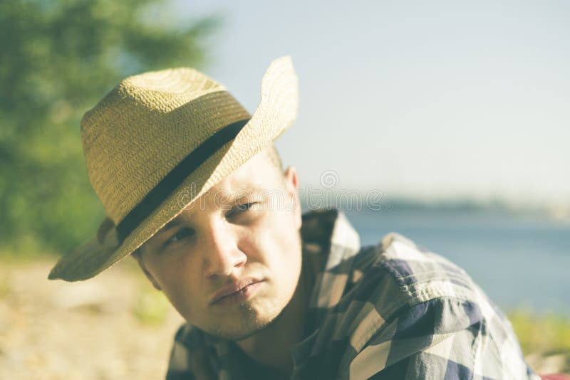 Close up portarit of young man relax and enjoy on the ocean beach lifestyle casual. Close up portarit of young man relax and enjoy on the ocean beach lifestyle casual