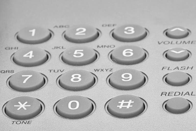 Chiuda sul colpo della tastiera grigia del telefono immagine stock Chiuda sul colpo della tastiera grigia del telefono immagine stock
