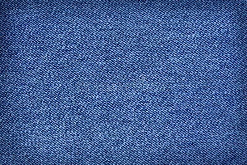 Chiusura dello sfondo della trama di blue jeans, pantaloni di denim con struttura uniforme