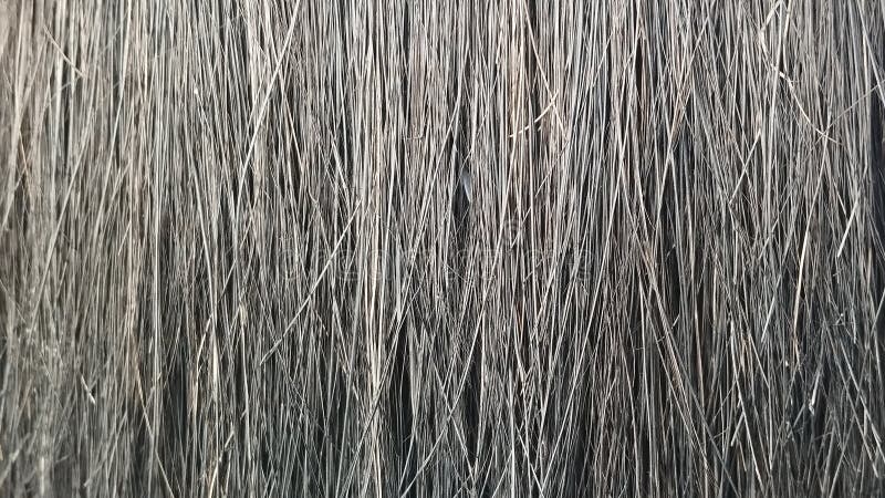 Chiusura dettagliata della trama per capelli scuri con fibre visibili. immagine stock libera da diritti