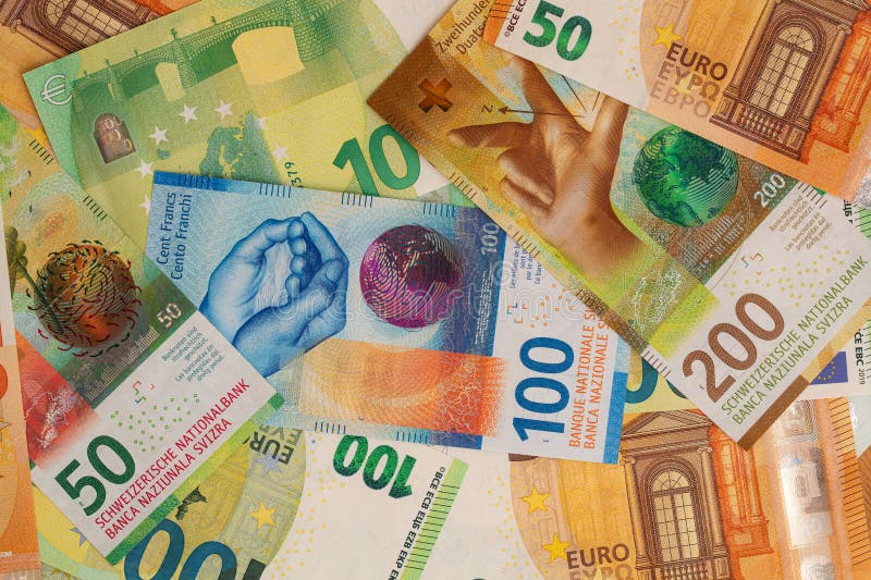 Closeup of 50, 100 and 200 Swiss franc banknotes and 100, 50 euro banknotes for design purpose. Closeup of 50, 100 and 200 Swiss franc banknotes and 100, 50 euro banknotes for design purpose