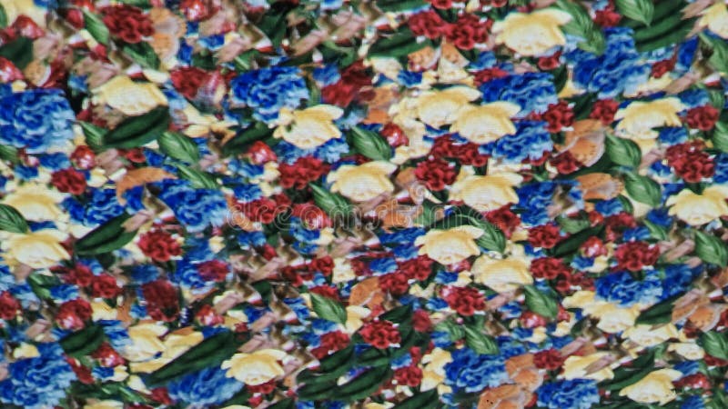 Chiusura di una colorata superficie floreale immagini stock