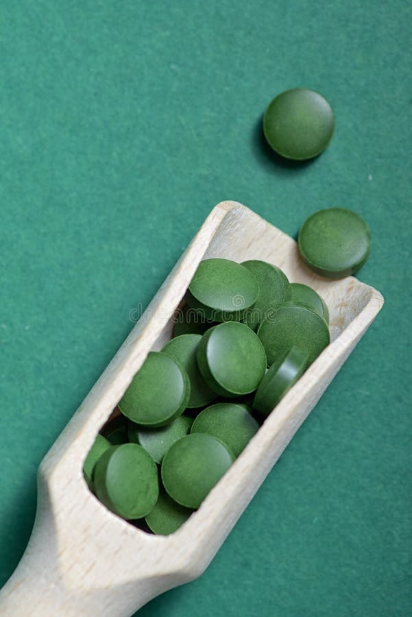 Chlorella spirulina pills stock image. Image of alternative 134840123