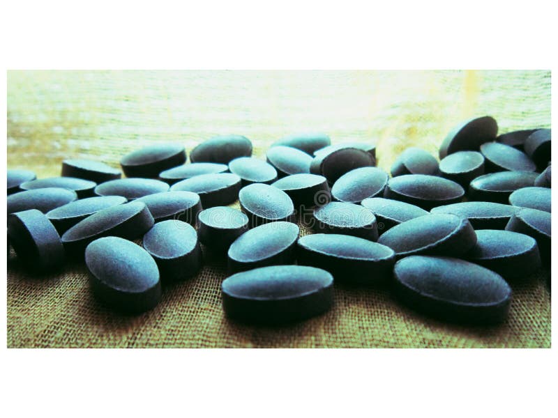 Chlorophyll in the Form of Green Tablets. Natural Food Supplement. Stock Image Image of green