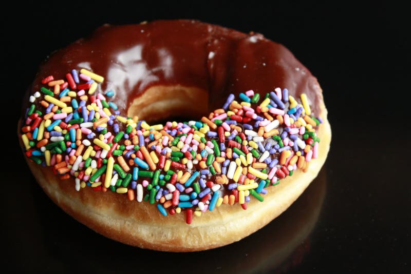 Chocoladeglazuurde donut royalty-vrije stock foto