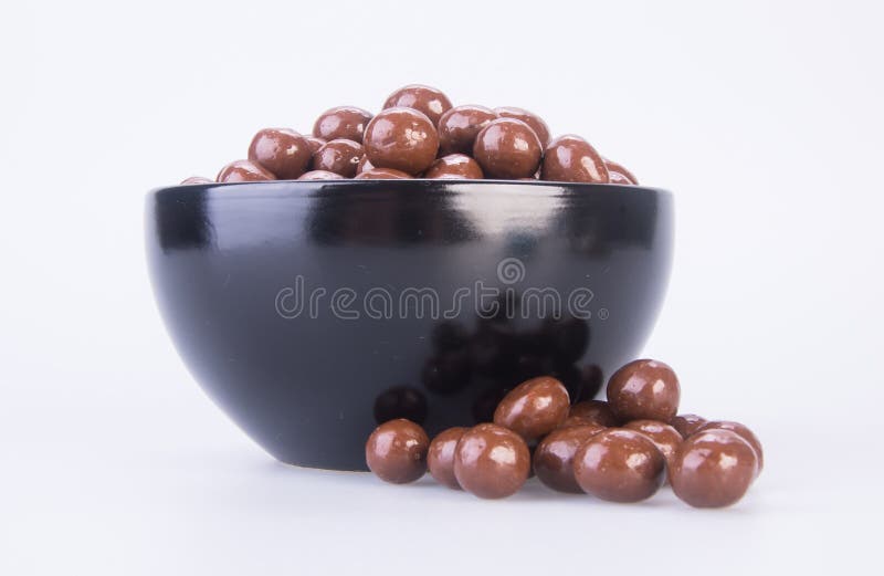 Chocolate Balls. Chocolate Balls in Bowl on a Background Stock Photo