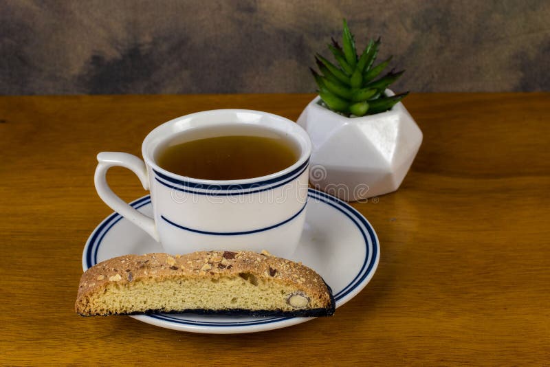 Chocolate Biscotti Served with a Cup of Green Tea Stock Photo Image