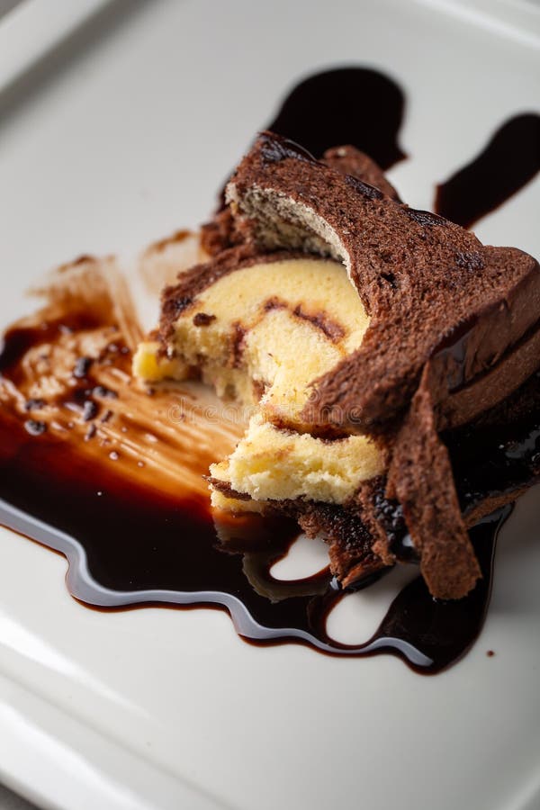 Chocolate Bread Stuffed with Jam Rolls Topped with Chocolate Sauce