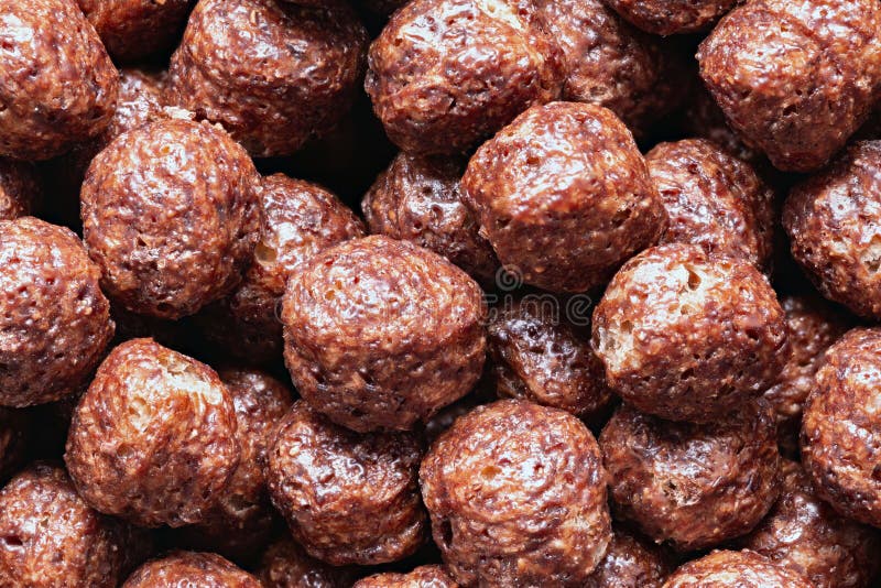 Chocolate Breakfast Cereal Texture. Cereal Balls As Background Stock