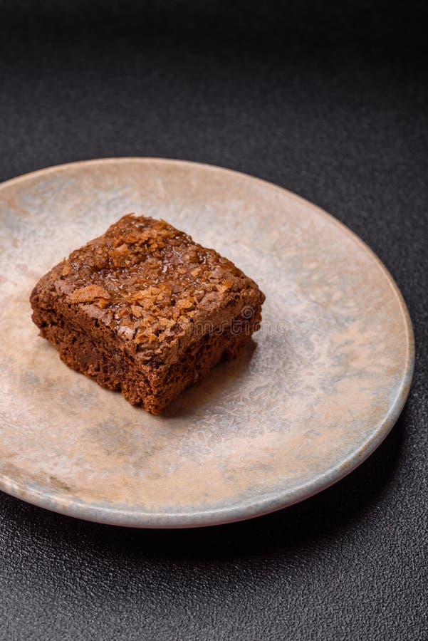 Chocolate brownie cake, food, sweet dessert with nuts rectangular shape. Sweet chocolate brownie royalty free stock image