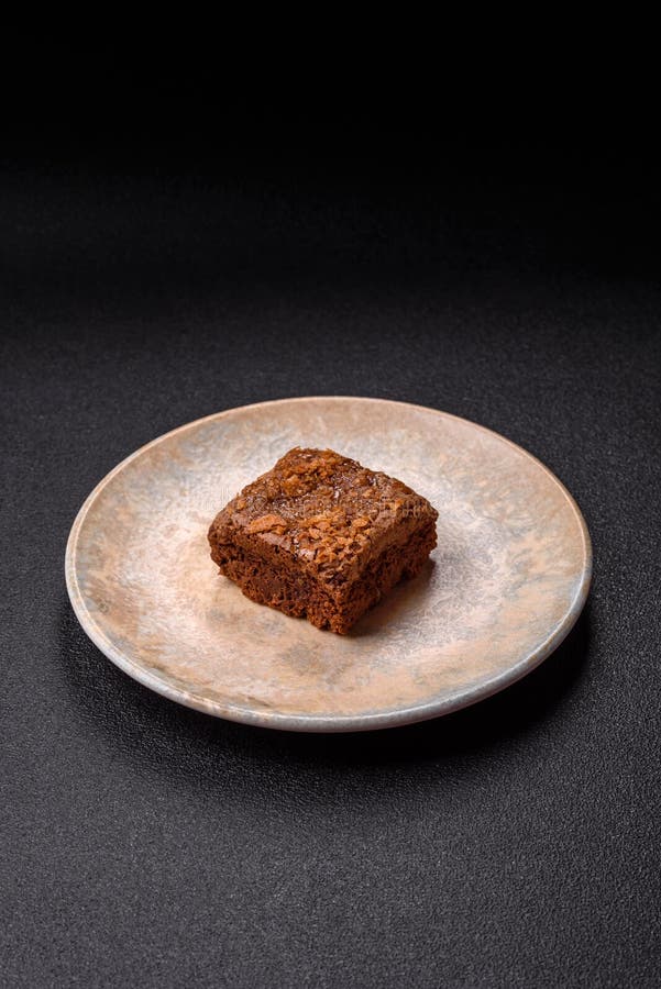 Chocolate brownie cake, food, sweet dessert with nuts rectangular shape. Sweet chocolate brownie royalty free stock photo