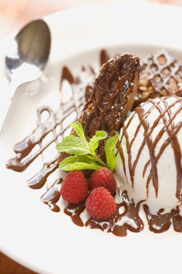 Chocolate brownie with ice cream stock photography