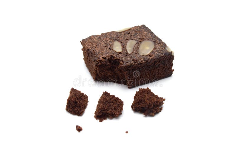 Chocolate brownie with sliced almond nuts toppings crumbs isolated on white background