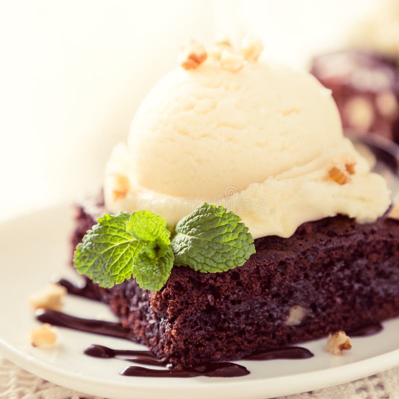 Chocolate Brownie with Vanilla Ice Cream, Nuts and Mint Stock Photo Image of bakery, food