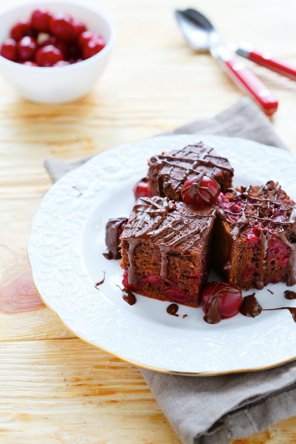 Chocolate brownies with cherries