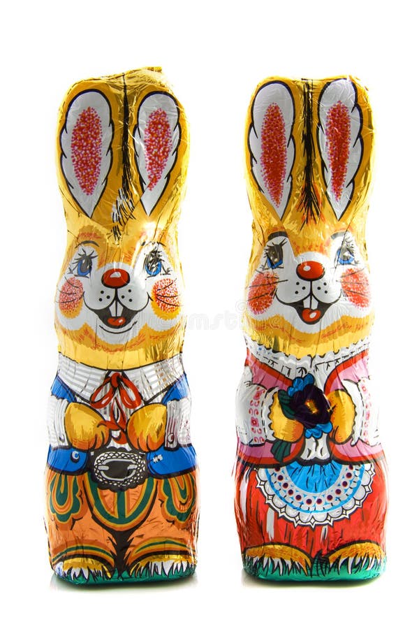 African Asian Girl Pointing a Giant Chocolate Rabbit Stock Photo