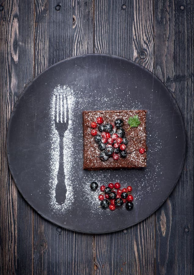 Chocolate cake brownie with summer berries