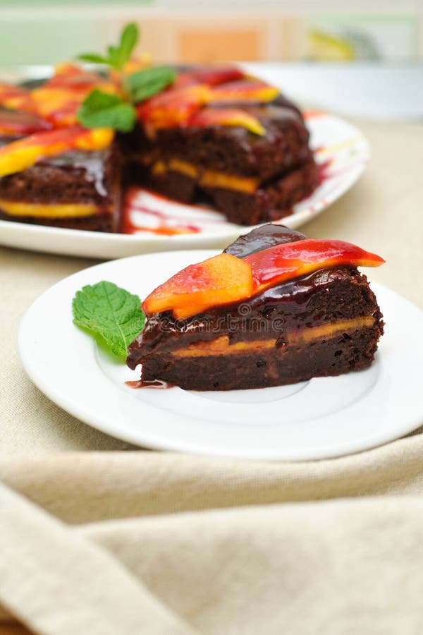 Chocolate cake and exotic fruits