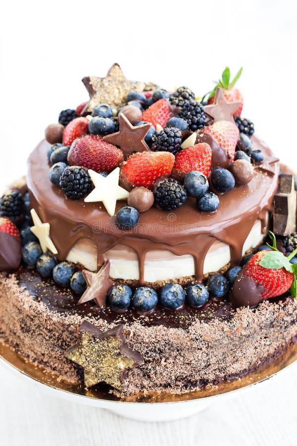 Chocolate Cake With Icing, Decorated With Fresh Fruit ...
