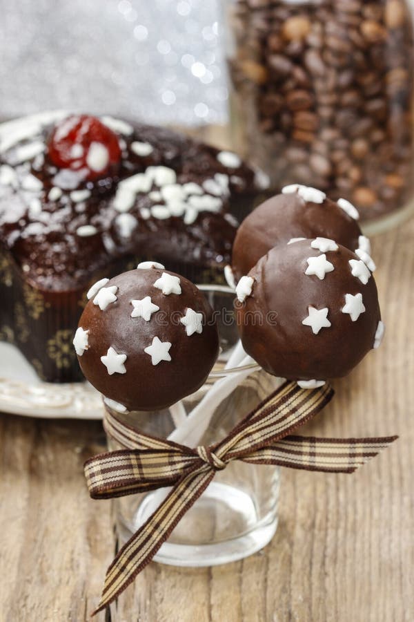 Chocolate cake pops decorated with sugar stars royalty free stock image