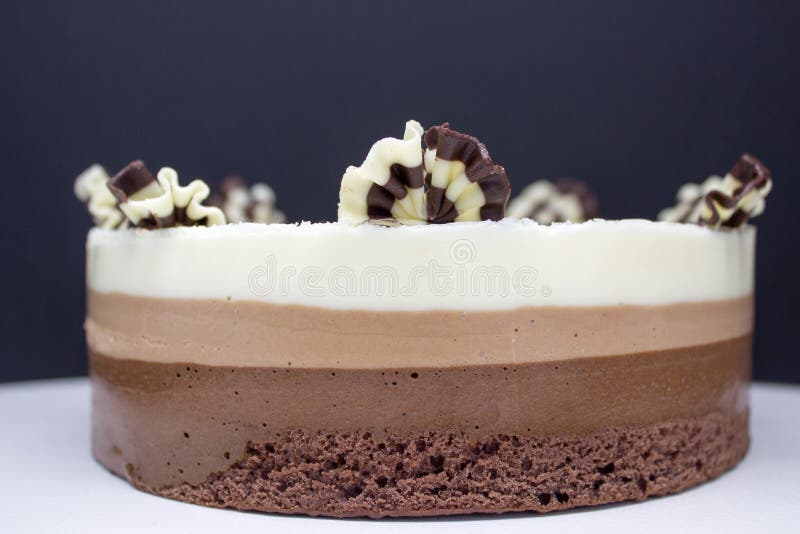Chocolate Cake. Cake of Several Varieties of Chocolate Black, Milk and