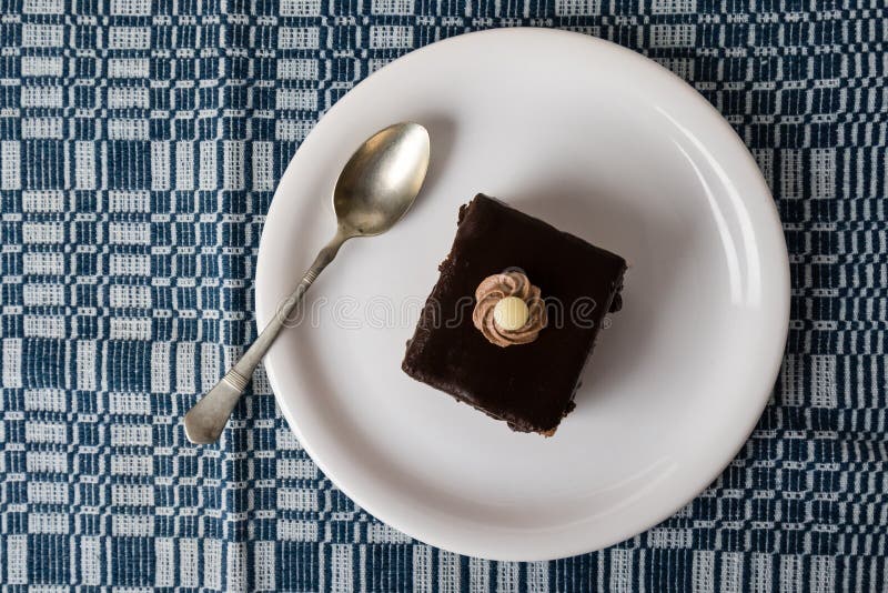 Chocolate cake on white plate