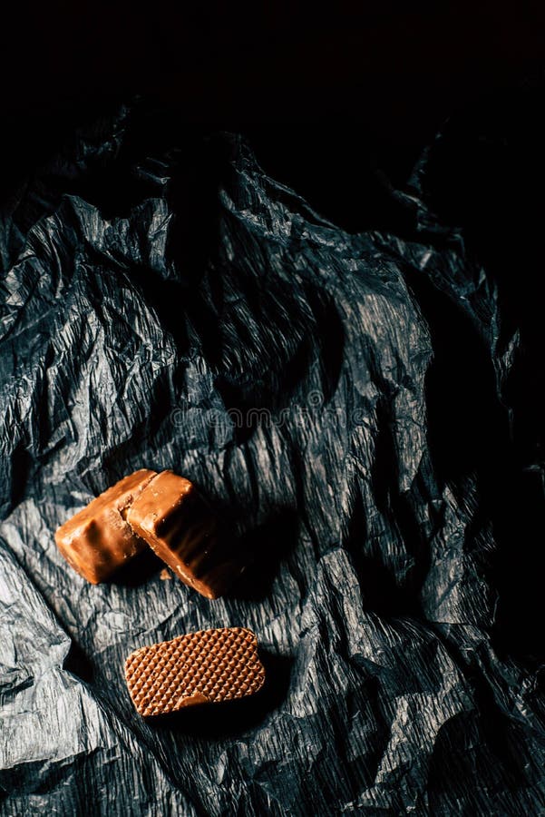 Chocolate candies on a black background royalty free stock photography Chocolate candies on a black background royalty free stock photography