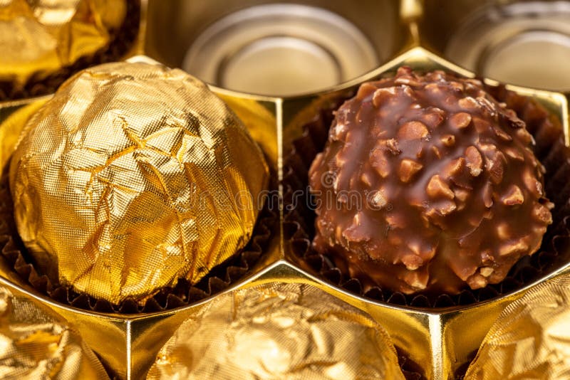 135 Chocolate Candies Gold Wrapping Stock Photos - Free & Royalty