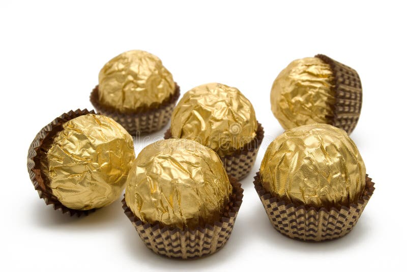Chocolate candies are in the gold wrapping