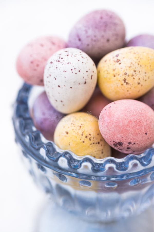 Chocolate Candy Easter Eggs in Pastel Colors in Blue Crystal Cup, Closeup Stock Image Image of