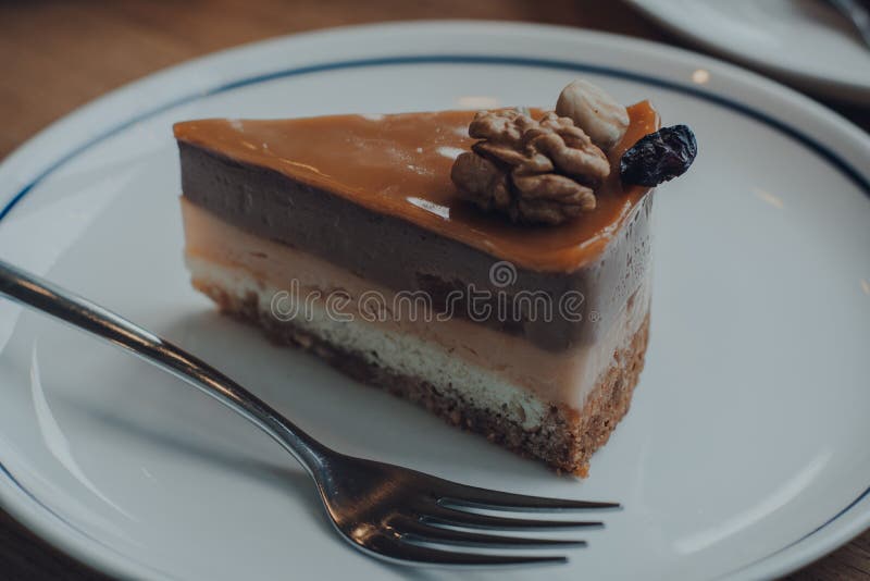Chocolate caramel nut cake stock photo. Image of coffee 128952256