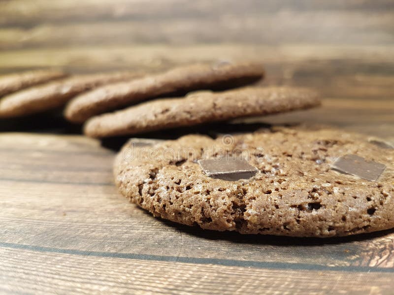 Chocolate chip cookies on a woodenn rustic table calories homemade dessert tradition