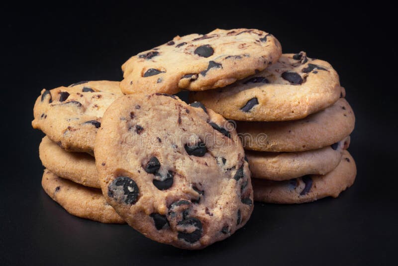 Chocolate cookies at black background