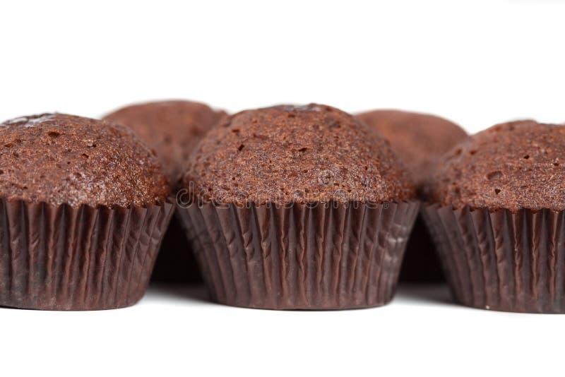 Chocolate cupcakes muffins on white