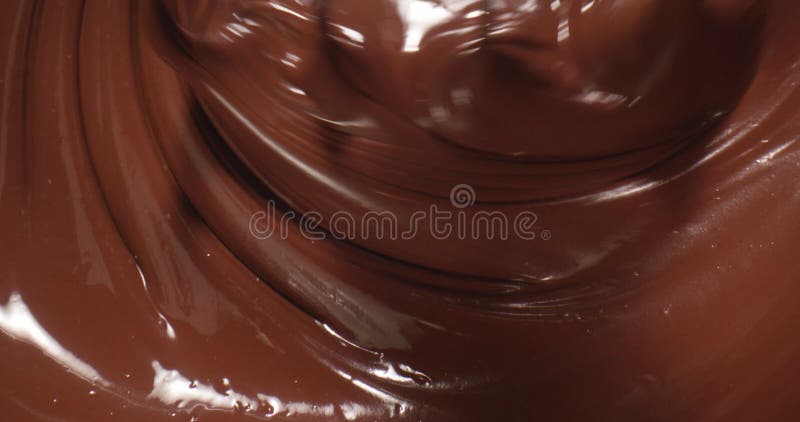 Chocolate derretido brilhante com uma espiral