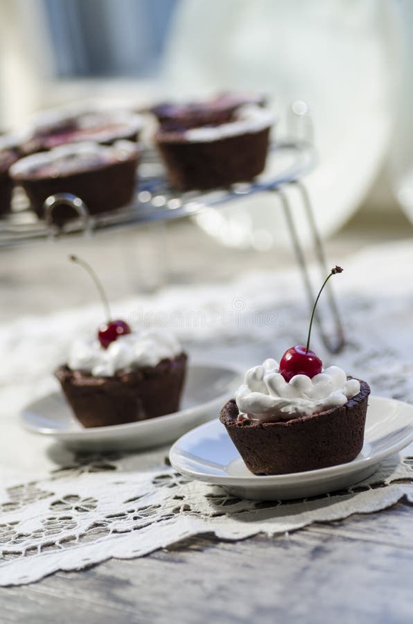 Chocolate dessert decorated with cherry