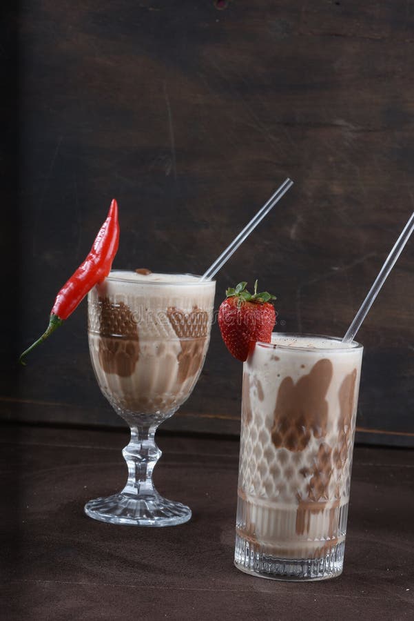 Chocolate Drink with Milk and Alcoholic Amarula with Strawberry Stock