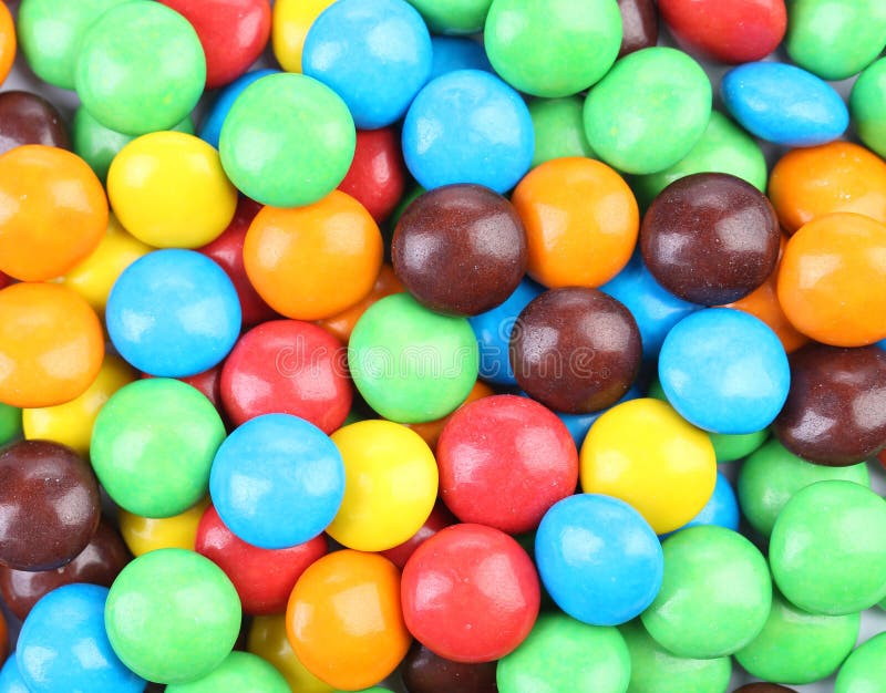Chocolate drops with bright colored candy coating