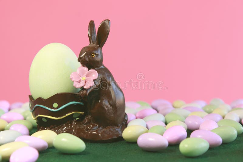 Chocolate Easter Bunny Holding Egg Stock Photo Image of bunny, easter