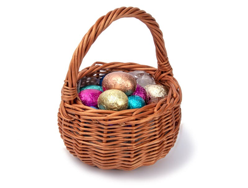Chocolate Easter Eggs in Wooden Basket Isolated on the White Stock