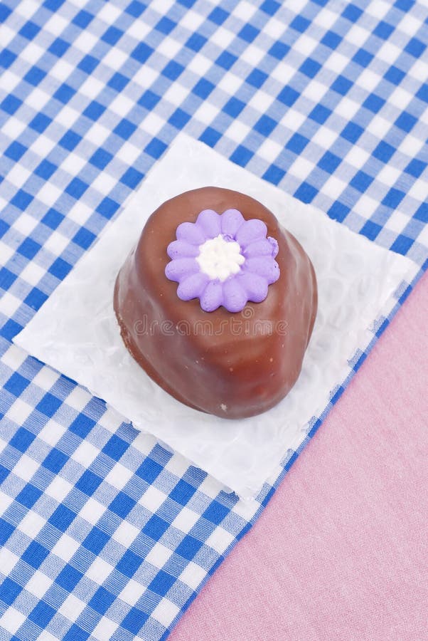 Chocolate Egg Candy with Cute Flower Icing