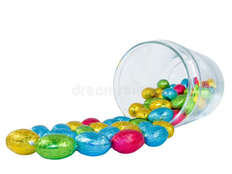 Chocolate eggs spilling out of a jar