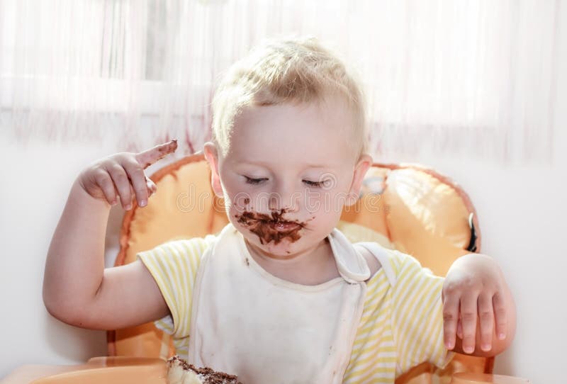 Chocolate on face stock photos