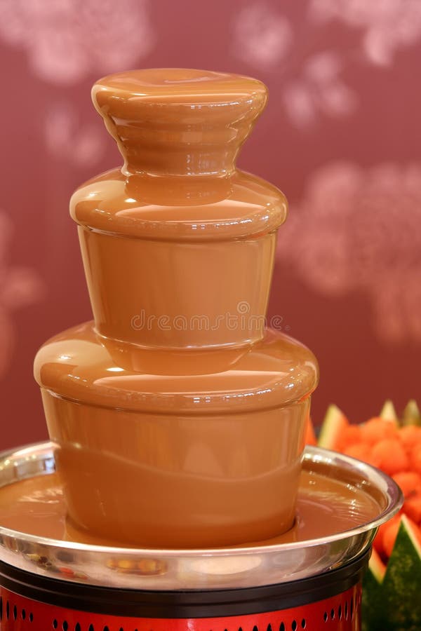 Chocolate Fountain on the Party or Wedding Reception Stock Photo