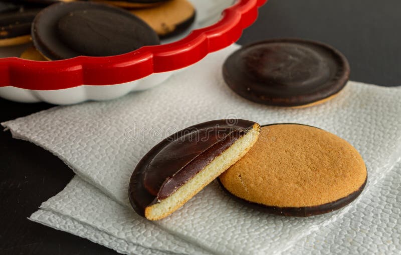 Chocolate Glazed Cookies with Marmalade. Closeup Sectional View. Stock